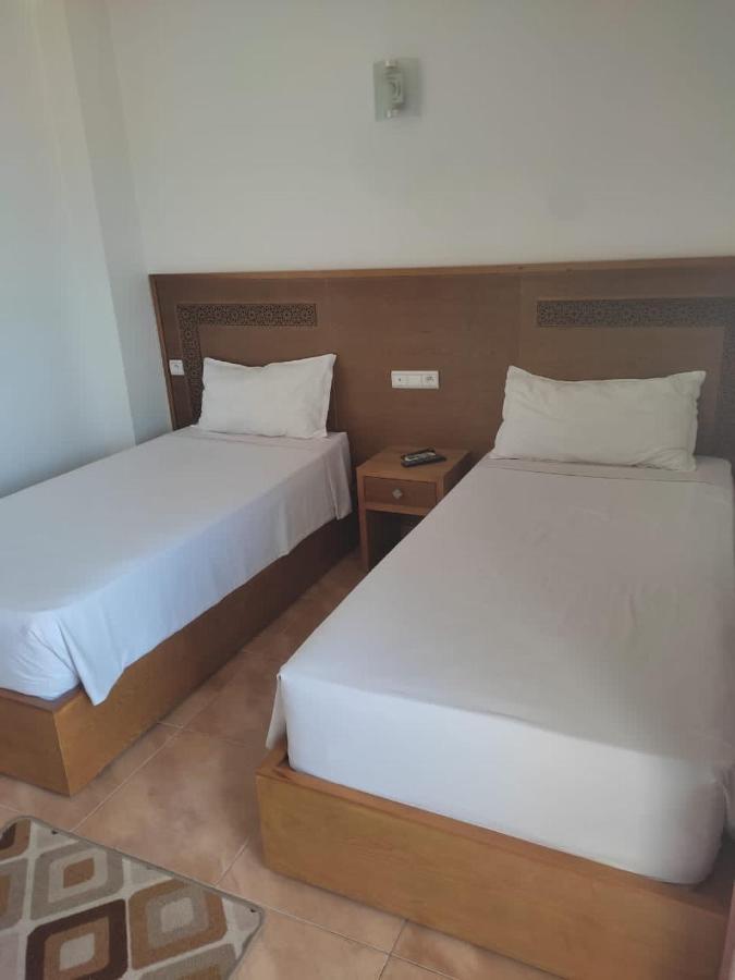 Hotel Nelson M'Diq Bagian luar foto